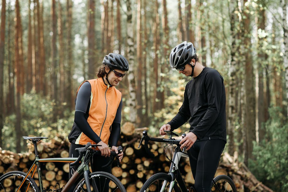Professional mountain biker conquering challenging trail through scenic mountain landscape